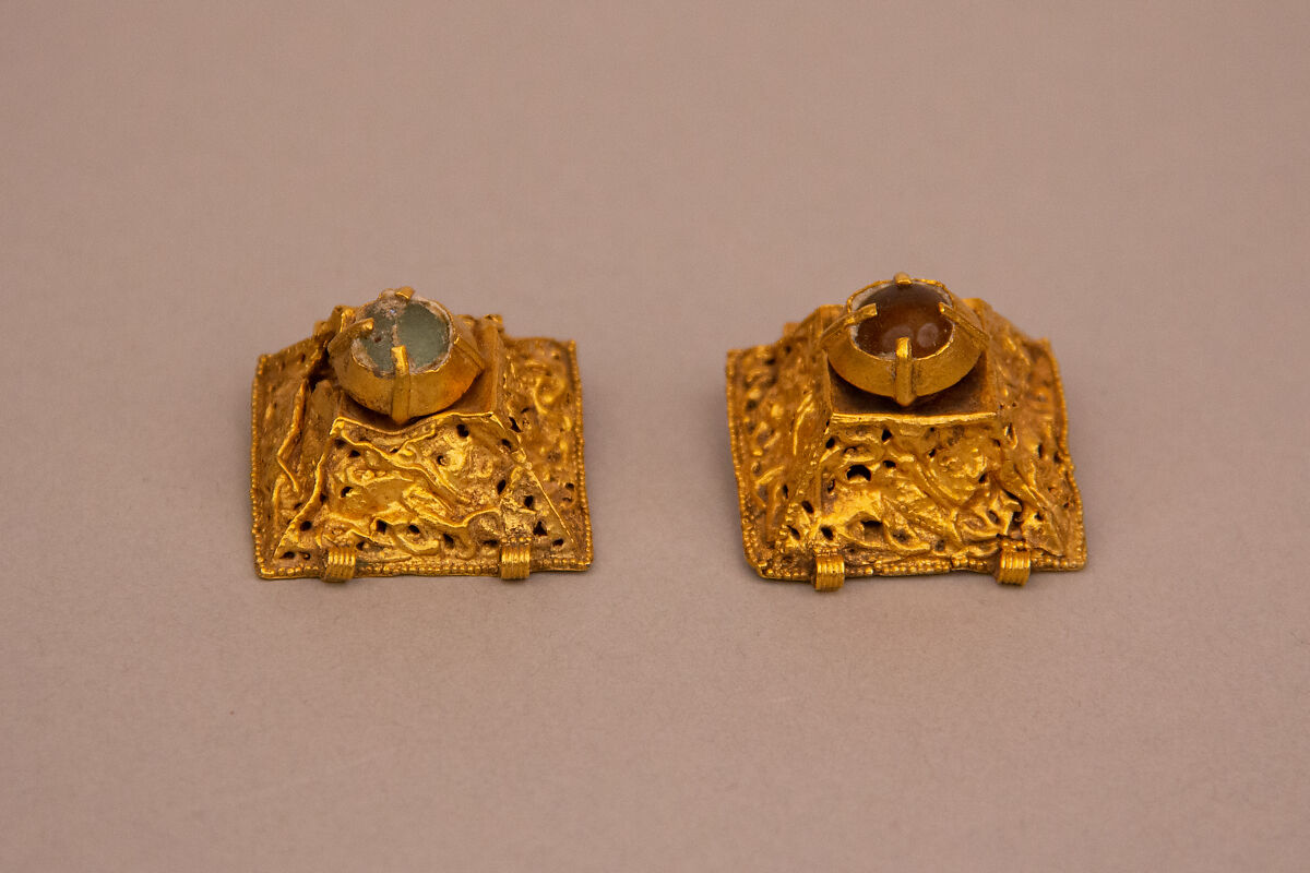 Ornament, One of a Pair, Gold; set with glass 