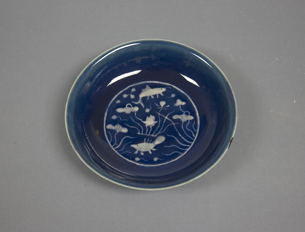 Dish, Porcelain with white reserve decoration against a blue background, China 