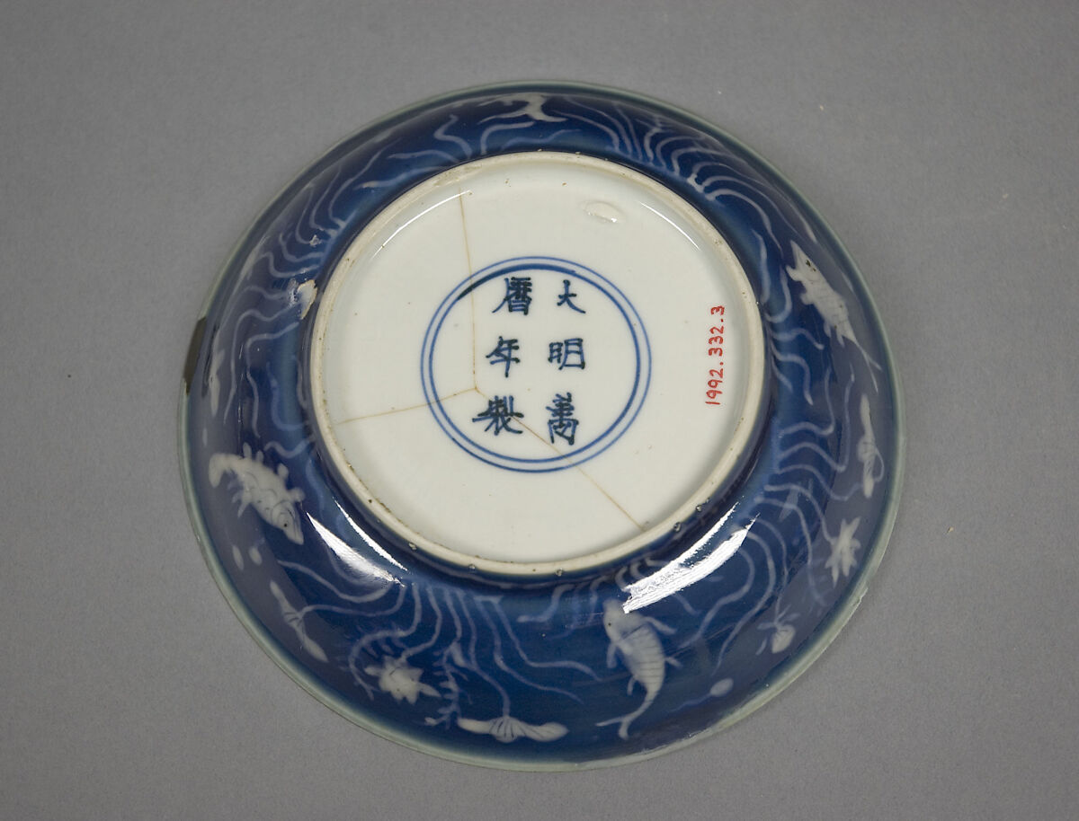 Dish, Porcelain with white reserve decoration against a blue background, China