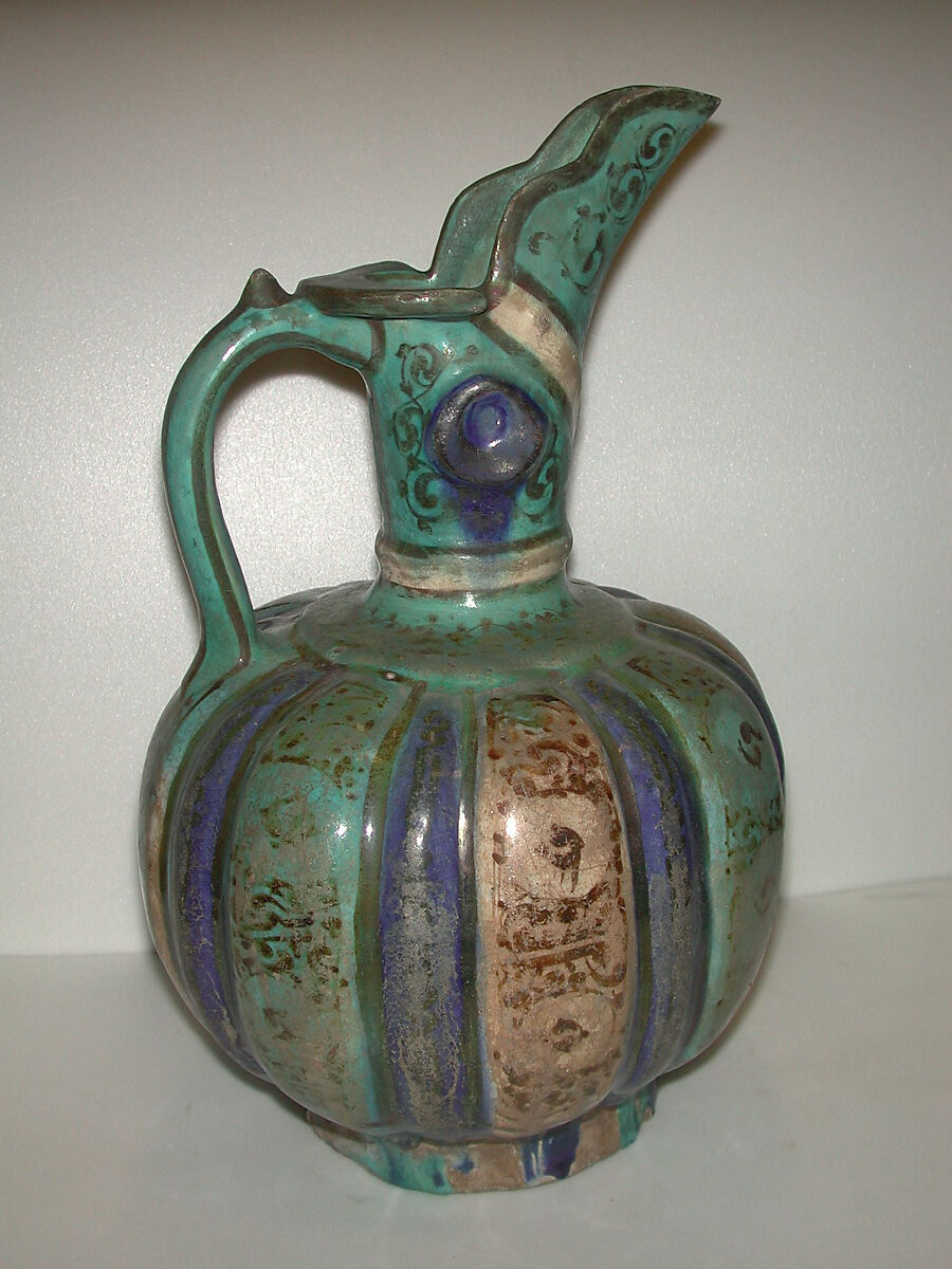 Ewer, Stonepaste;  molded and applied decoration, underglaze painted and luster-painted 