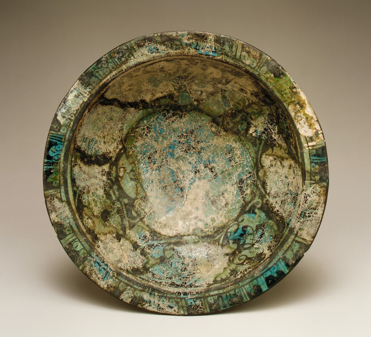 Bowl with Knotted Dragons, Stonepaste; underglaze-painted, transparent turquoise glaze 