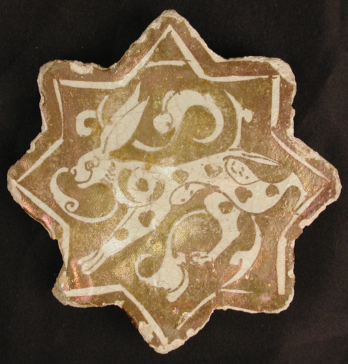 Star-Shaped Tile, Stonepaste; luster-painted