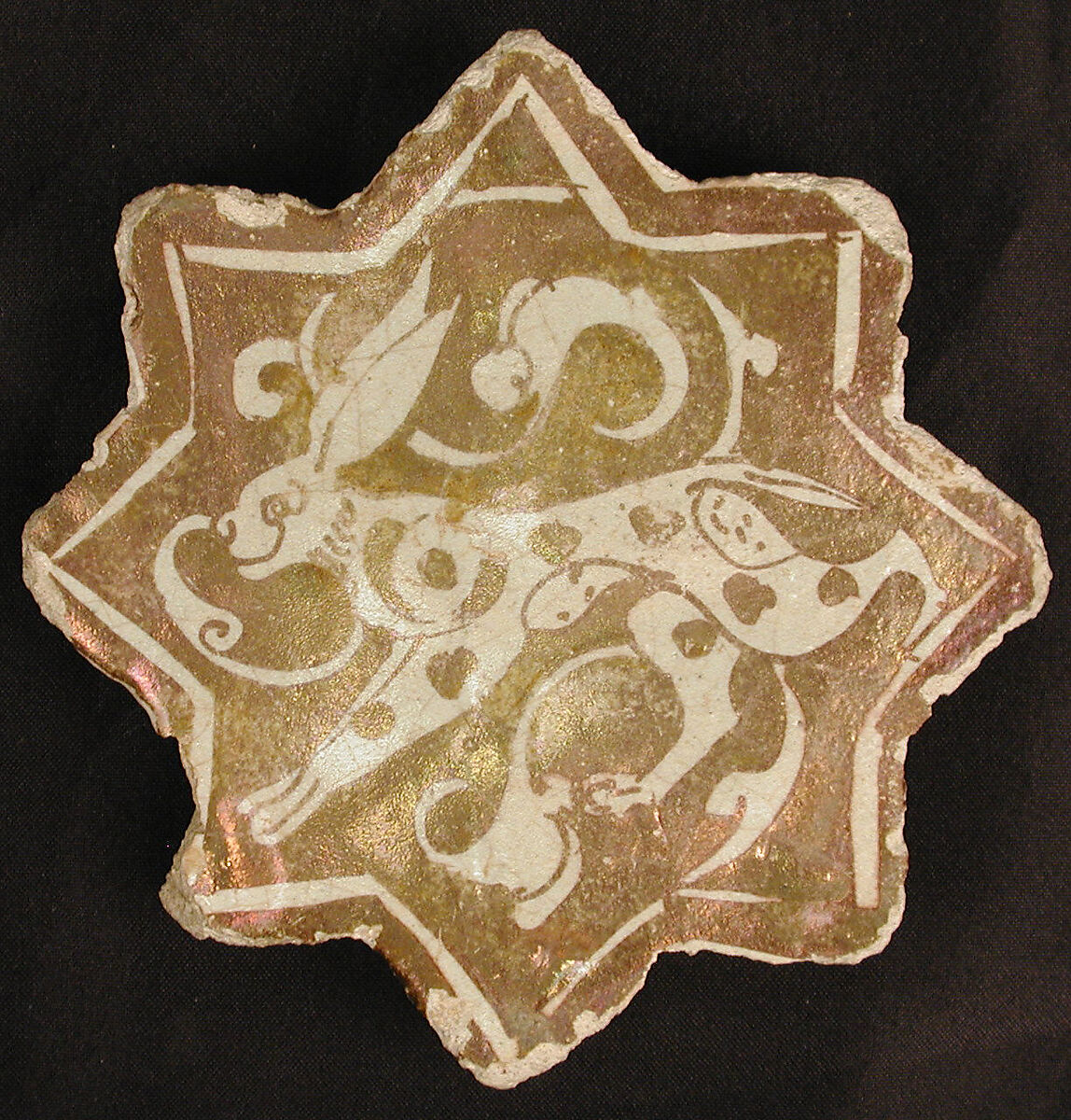 Star-Shaped Tile, Stonepaste; luster-painted 