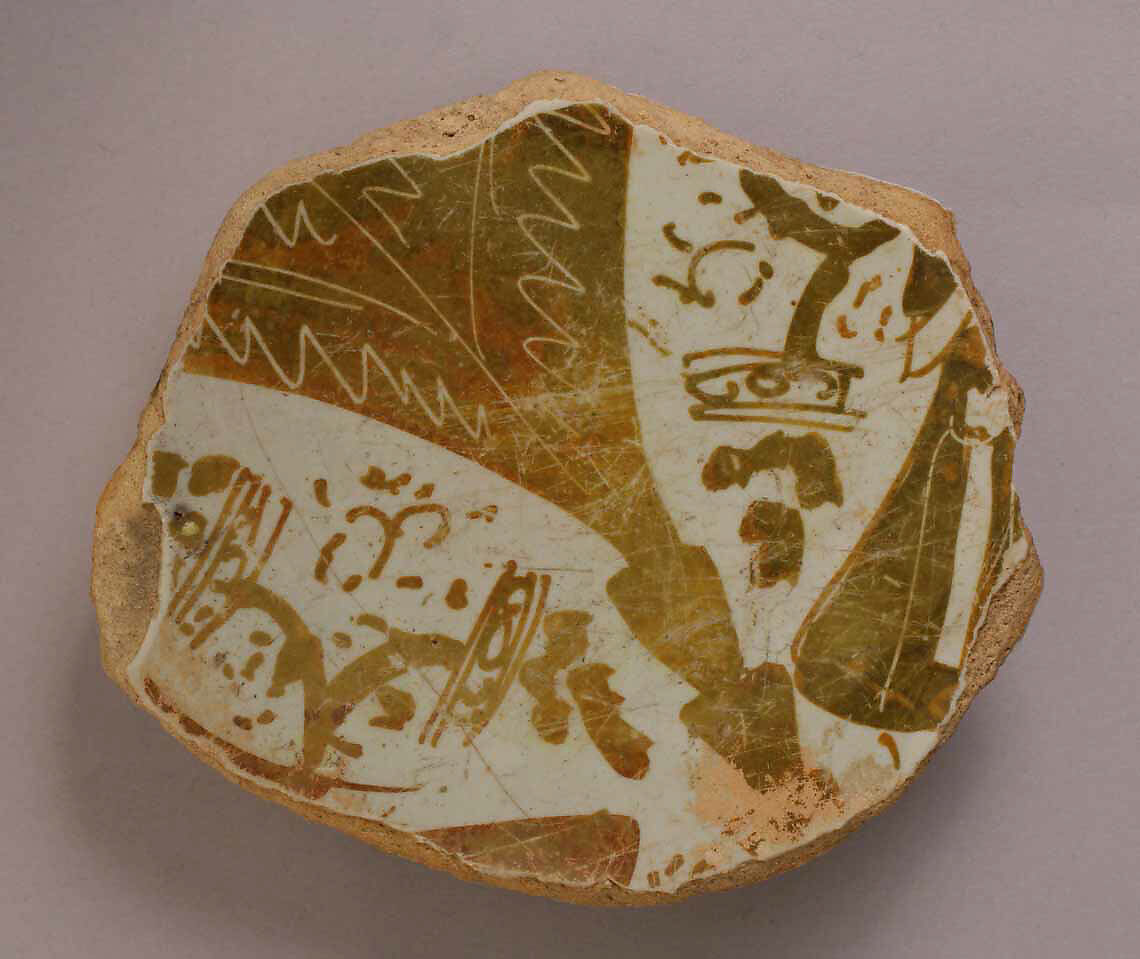 Fragment of a Bowl, Earthenware; luster-painted on opaque white glaze 