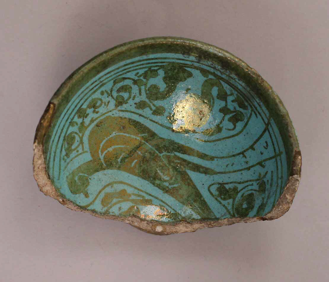 Fragment of a Bowl, Stonepaste; black slip painted under transparent glaze 