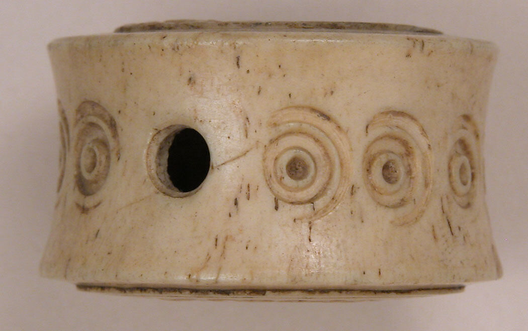 Spool, Bone; pierced, incised, and inlaid with paint