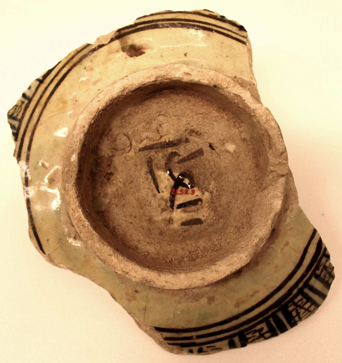 Fragment of a Dish, Stonepaste; polychrome painted under transparent glaze