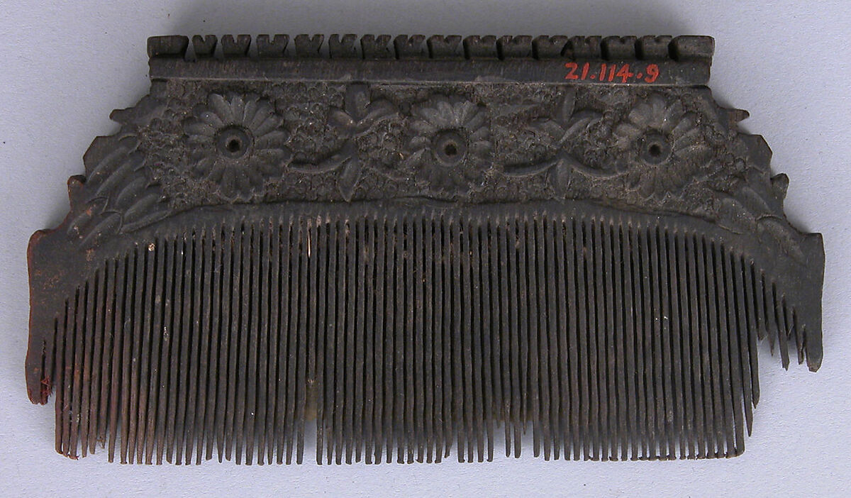 Comb, Wood; carved, inlaid with ebony? 