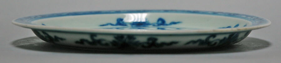 Saucer with pomegranates and peaches, Porcelain painted in underglaze cobalt blue (Jingdezhen ware), China