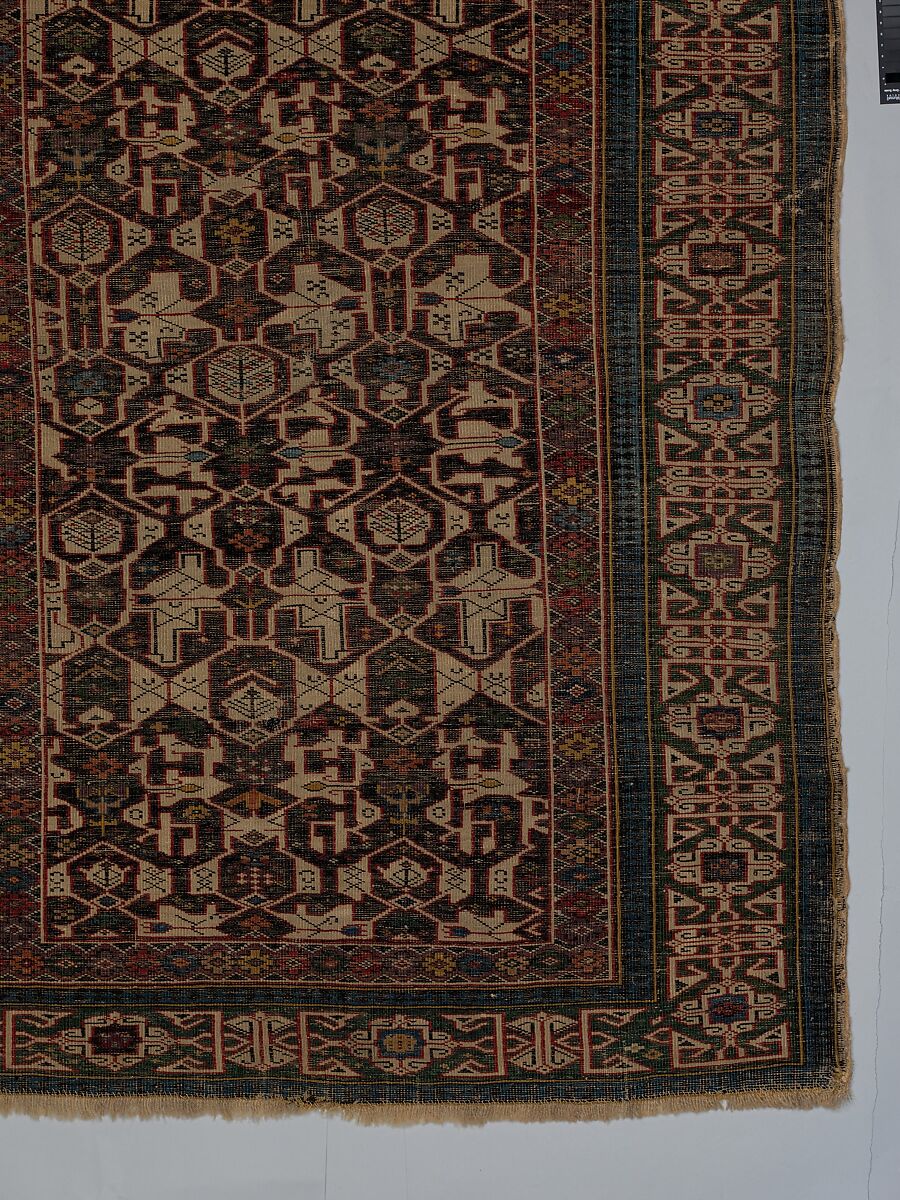 Kufesque-Border Lattice Shirvan Rug, Wool (warp, weft and pile); symmetrically knotted pile