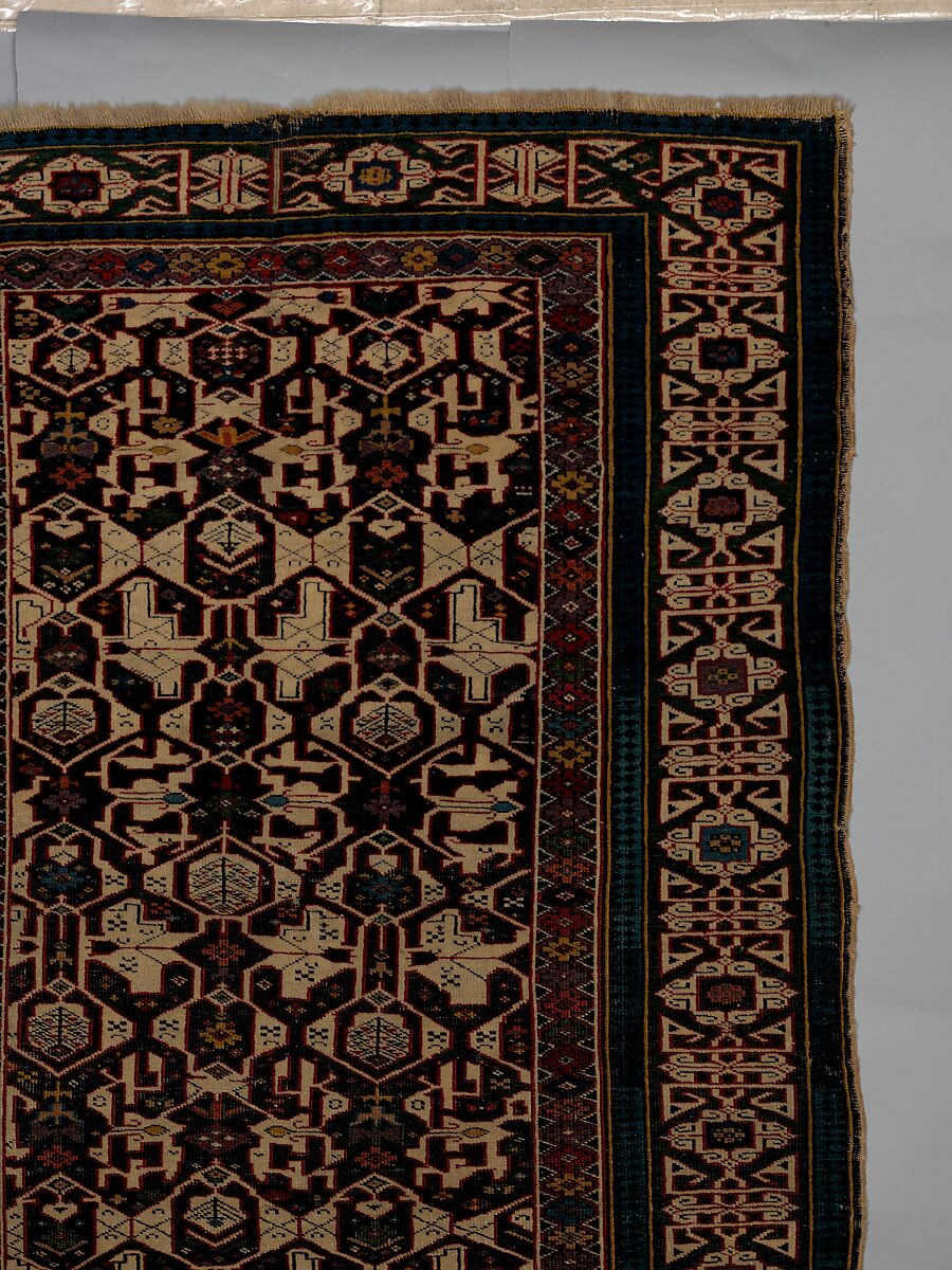 Kufesque-Border Lattice Shirvan Rug, Wool (warp, weft and pile); symmetrically knotted pile