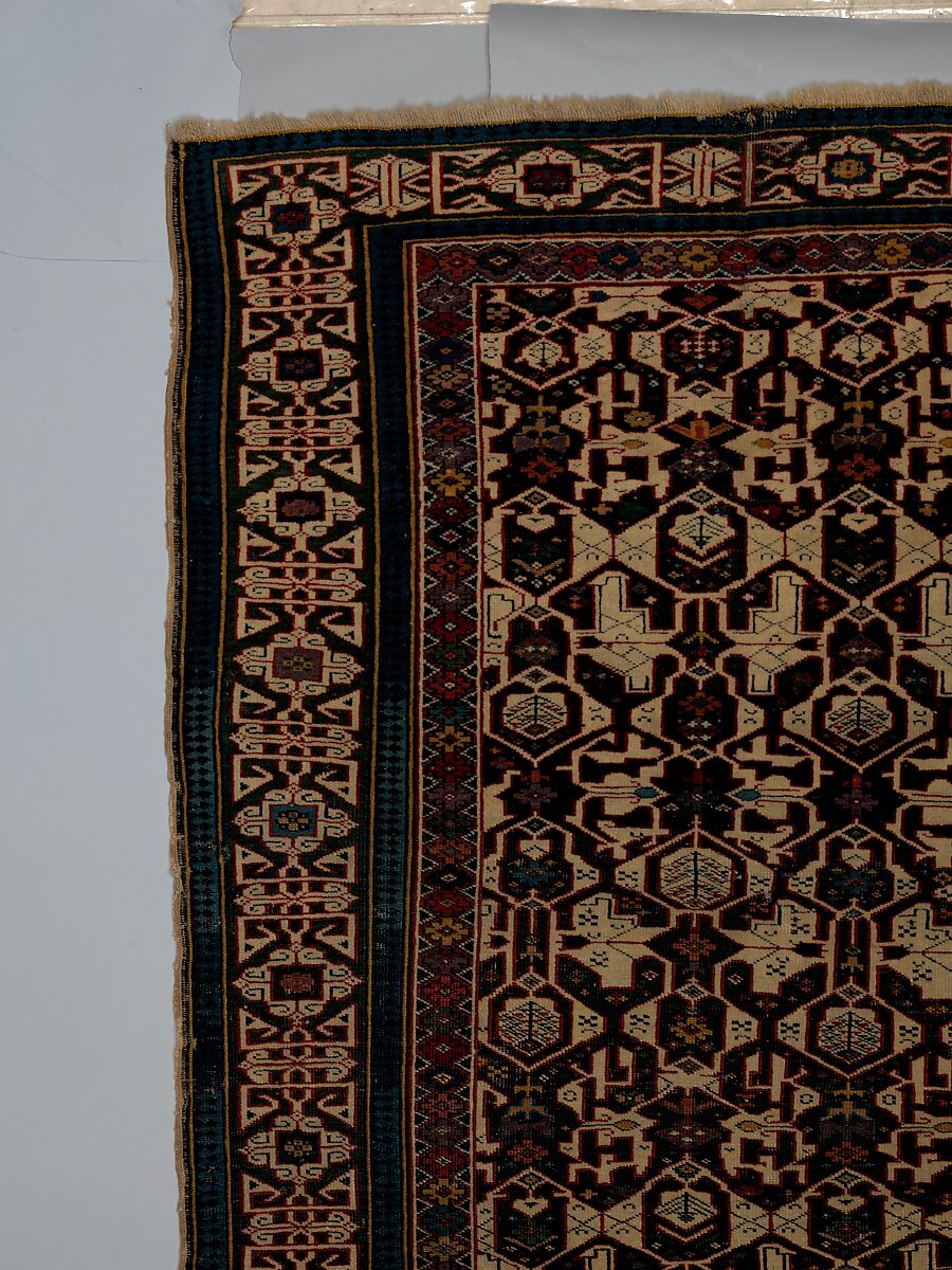 Kufesque-Border Lattice Shirvan Rug, Wool (warp, weft and pile); symmetrically knotted pile