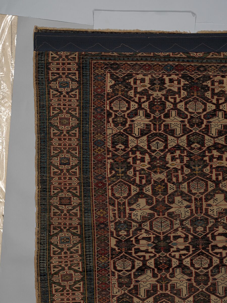 Kufesque-Border Lattice Shirvan Rug, Wool (warp, weft and pile); symmetrically knotted pile