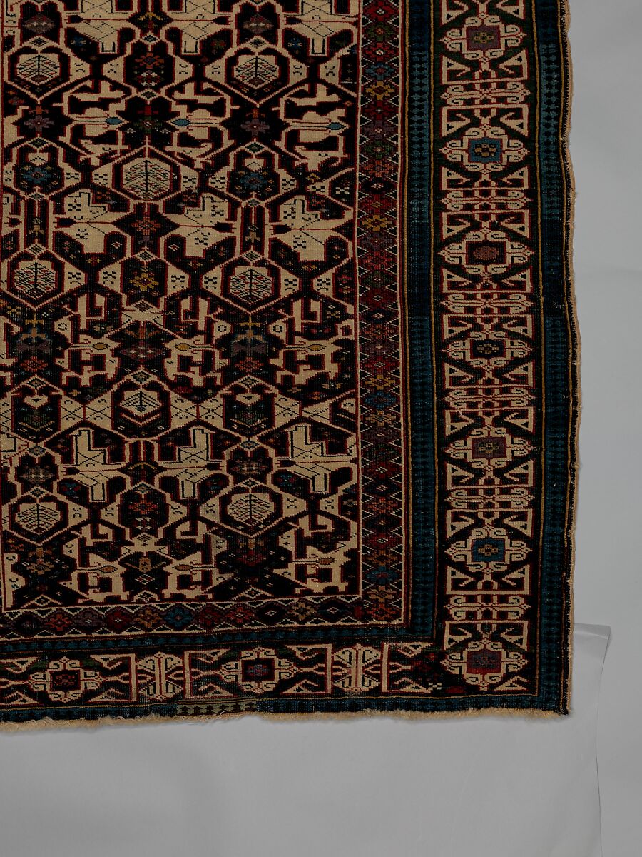 Kufesque-Border Lattice Shirvan Rug, Wool (warp, weft and pile); symmetrically knotted pile