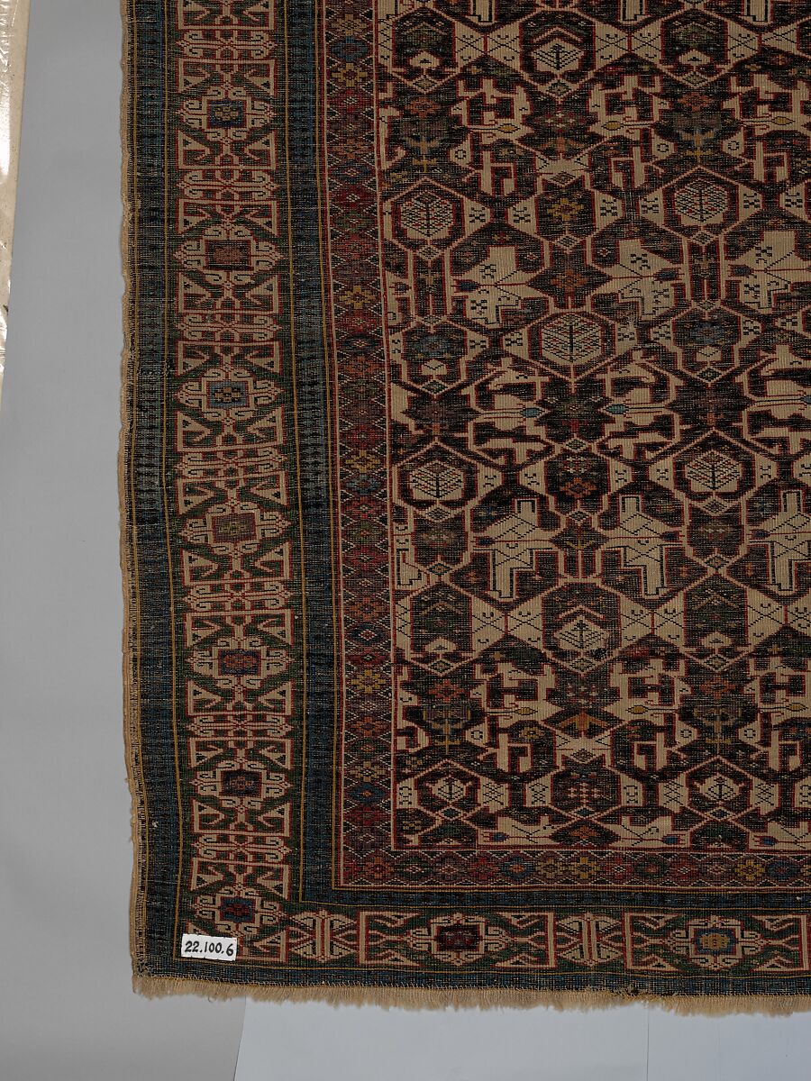 Kufesque-Border Lattice Shirvan Rug, Wool (warp, weft and pile); symmetrically knotted pile
