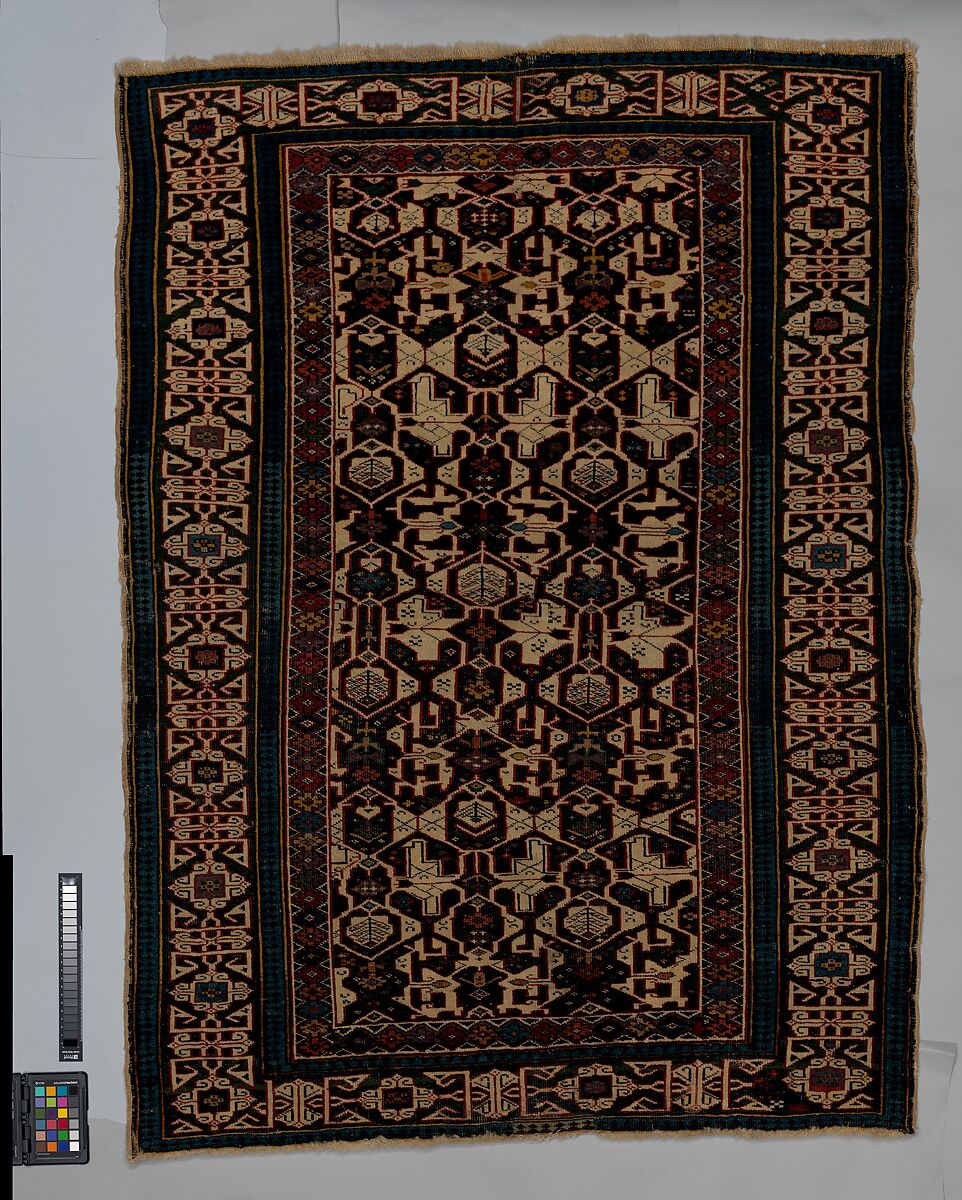 Kufesque-Border Lattice Shirvan Rug, Wool (warp, weft and pile); symmetrically knotted pile