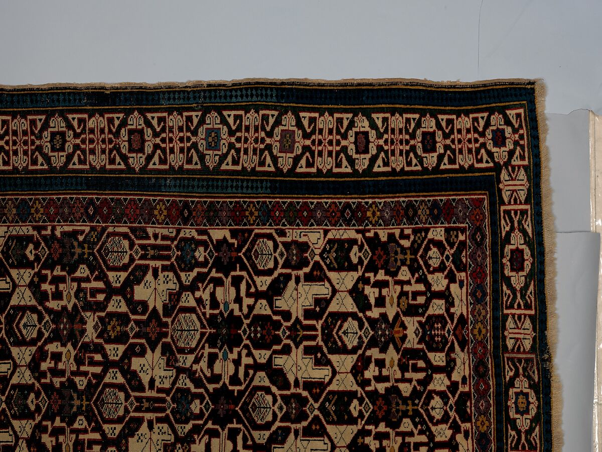 Kufesque-Border Lattice Shirvan Rug, Wool (warp, weft and pile); symmetrically knotted pile