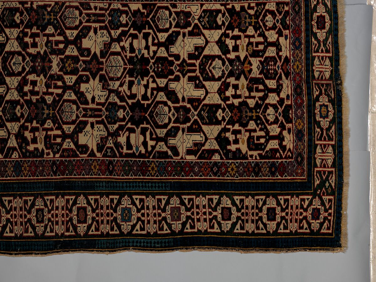 Kufesque-Border Lattice Shirvan Rug, Wool (warp, weft and pile); symmetrically knotted pile
