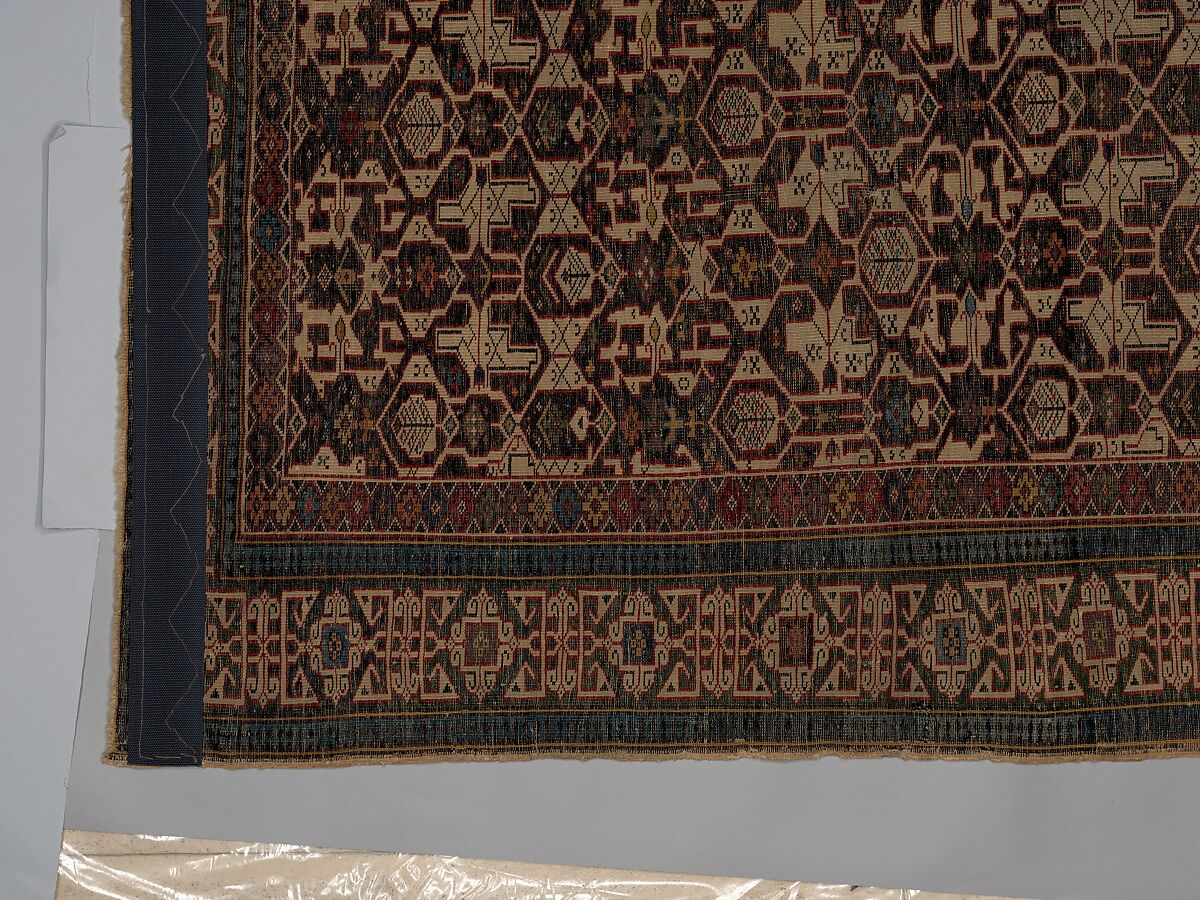 Kufesque-Border Lattice Shirvan Rug, Wool (warp, weft and pile); symmetrically knotted pile