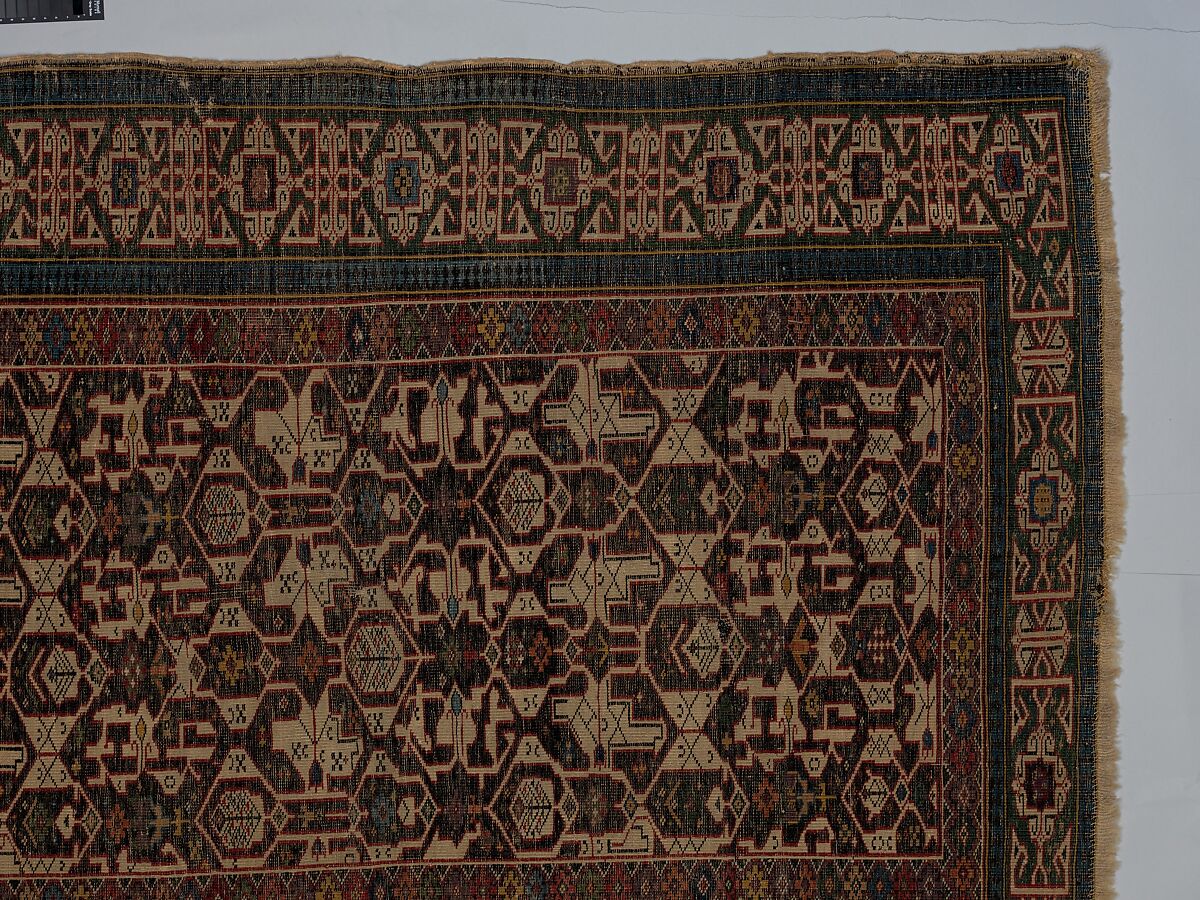 Kufesque-Border Lattice Shirvan Rug, Wool (warp, weft and pile); symmetrically knotted pile