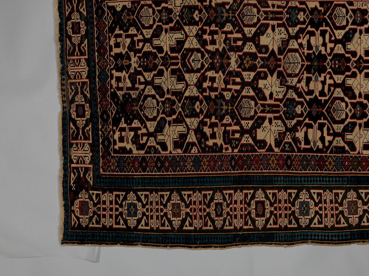 Kufesque-Border Lattice Shirvan Rug, Wool (warp, weft and pile); symmetrically knotted pile