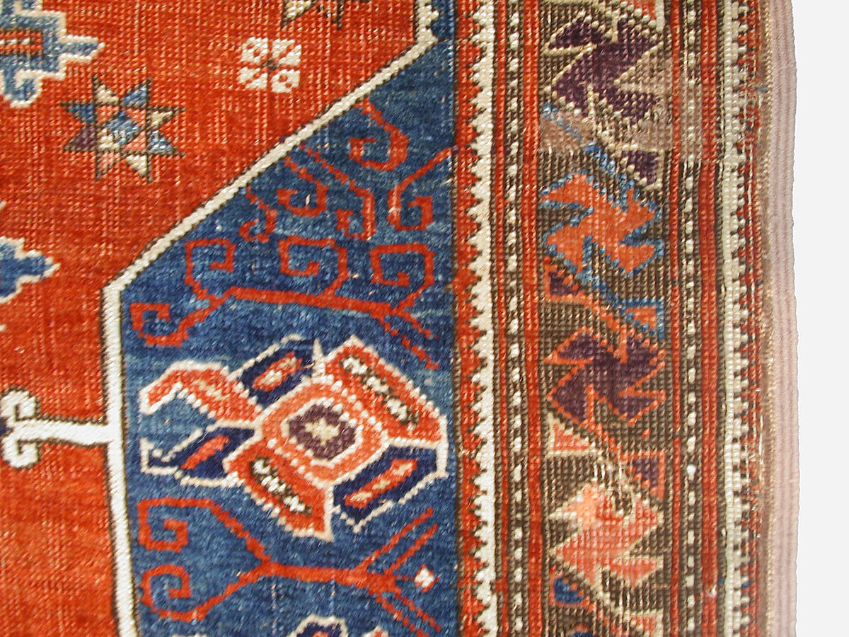 Tribal Carpet with Medallion Design, Wool (warp, weft and pile); symmetrically knotted pile