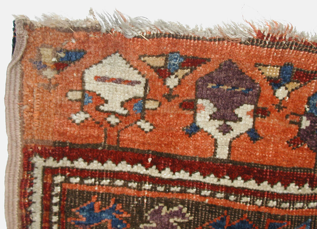 Tribal Carpet with Medallion Design, Wool (warp, weft and pile); symmetrically knotted pile