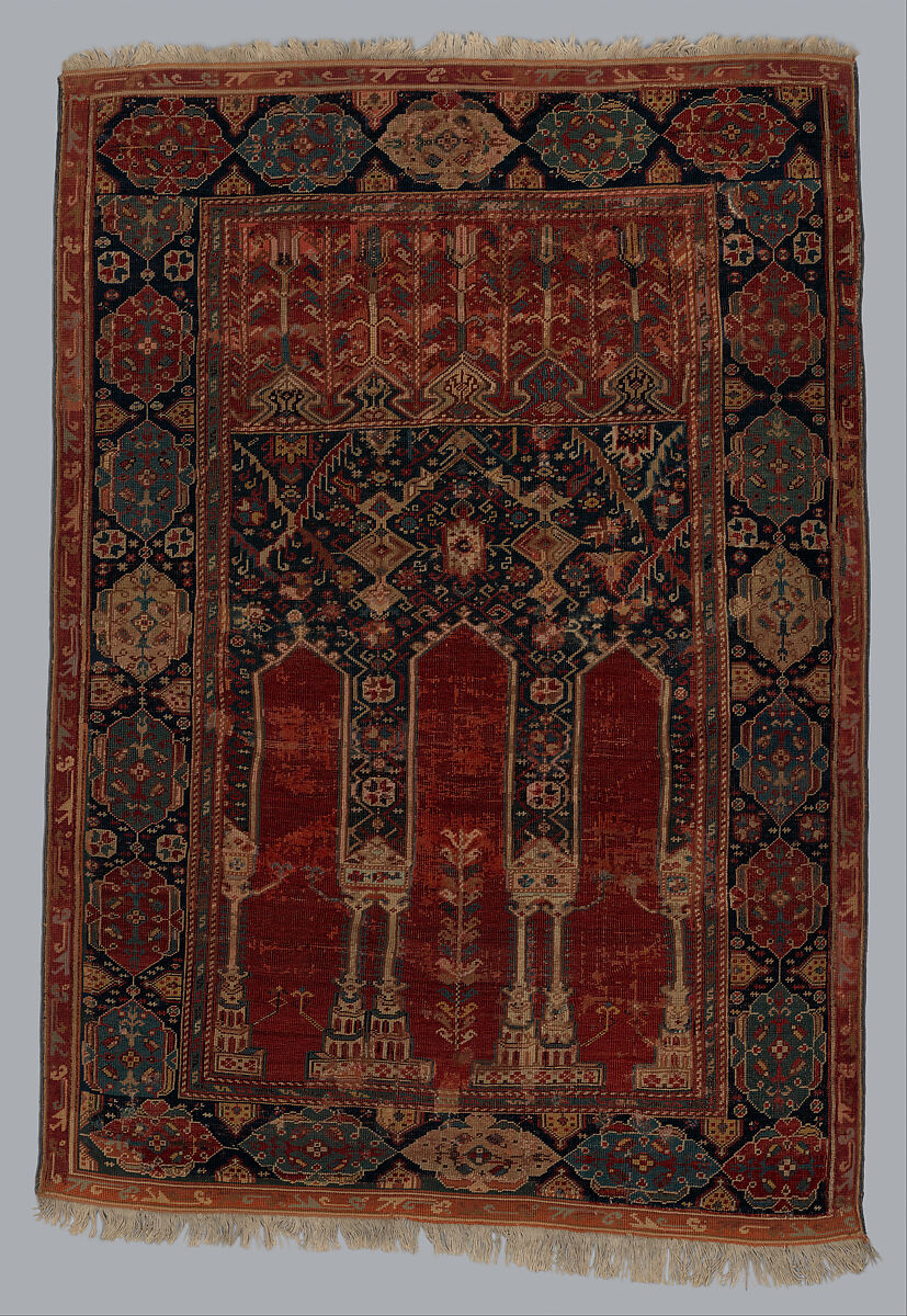 Prayer Rug with Coupled Columns, Wool (warp, weft and pile); symmetrically knotted pile 