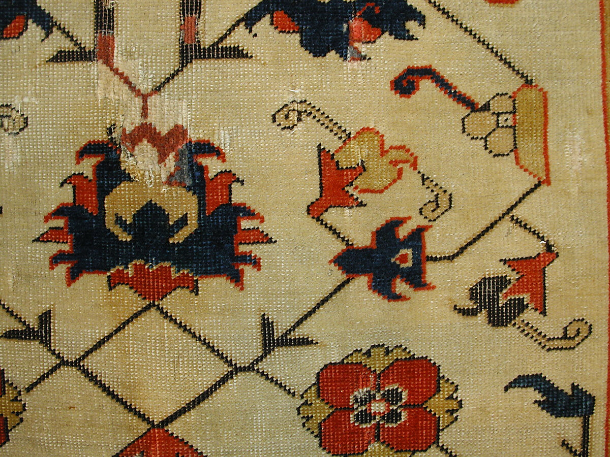 Carpet, Wool (warp, weft and pile); symmetrically and asymmetrically knotted pile