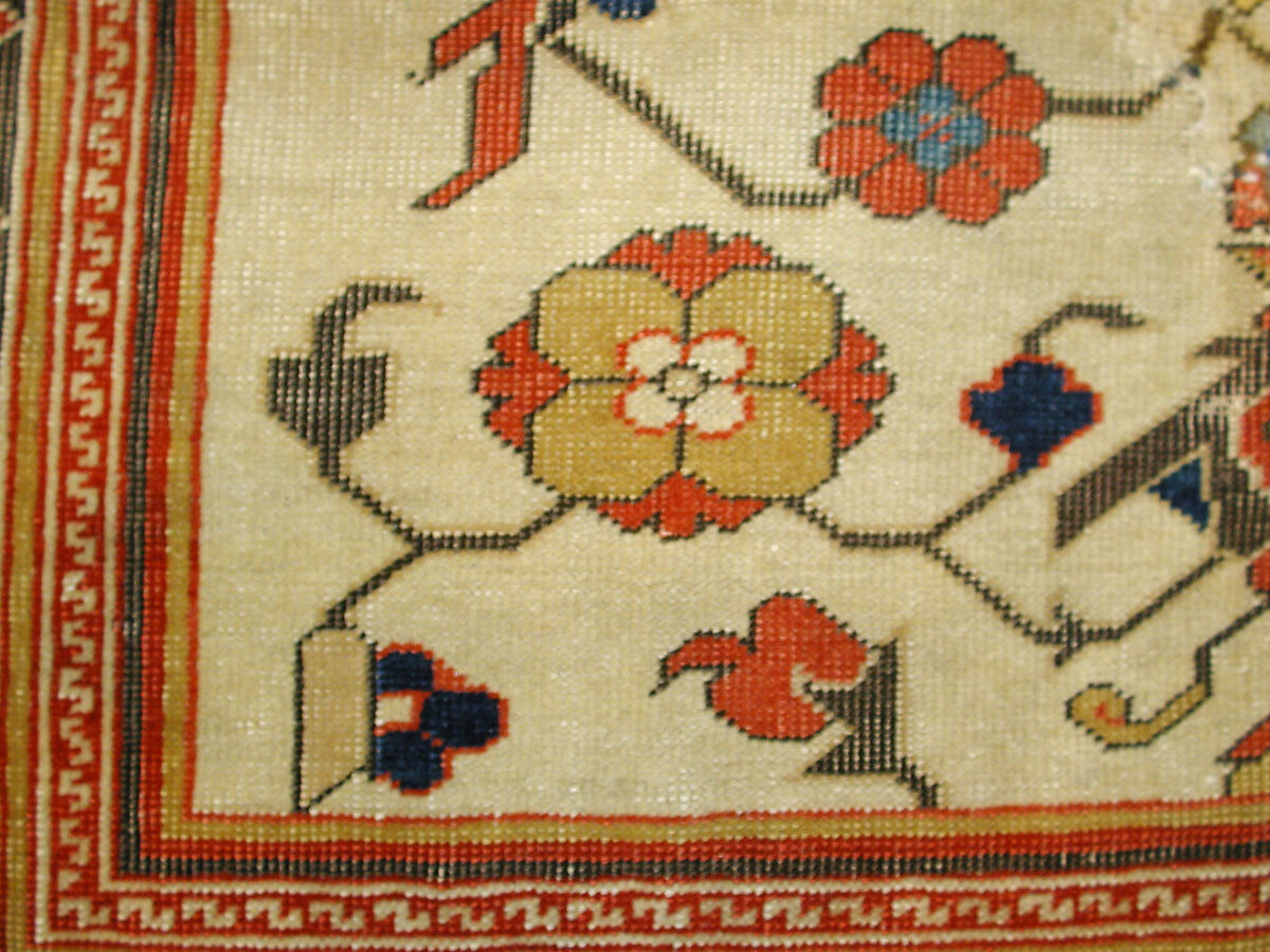 Carpet, Wool (warp, weft and pile); symmetrically and asymmetrically knotted pile