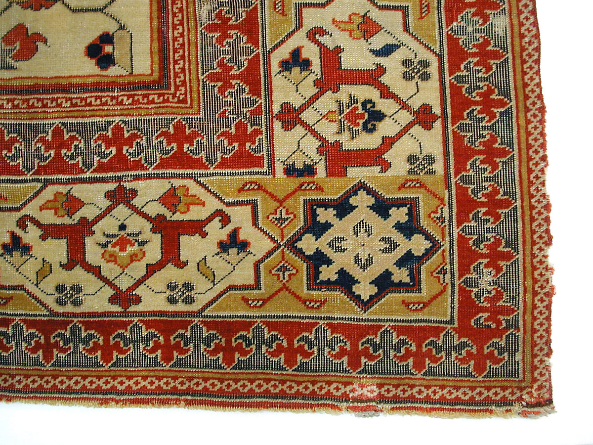 Carpet, Wool (warp, weft and pile); symmetrically and asymmetrically knotted pile