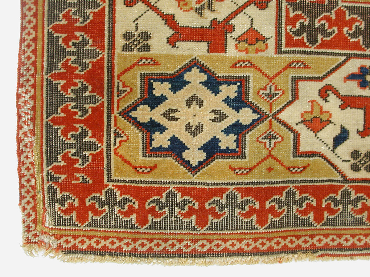 Carpet, Wool (warp, weft and pile); symmetrically and asymmetrically knotted pile