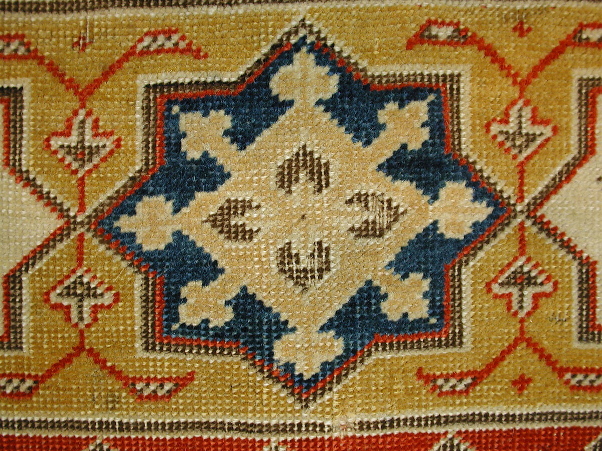 Carpet, Wool (warp, weft and pile); symmetrically and asymmetrically knotted pile