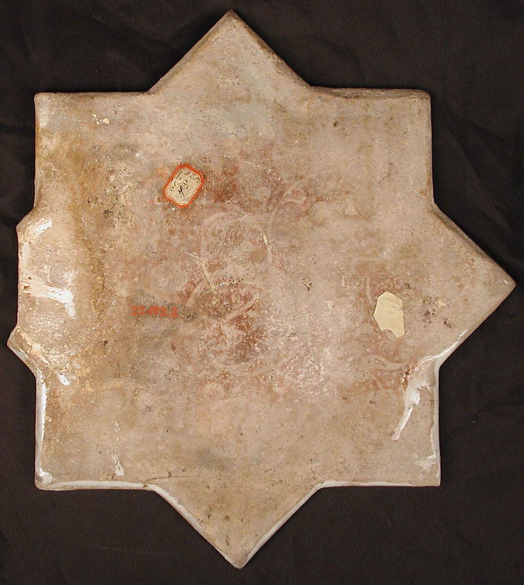 Star-Shaped Tile, Stonepaste; overglaze luster-painted