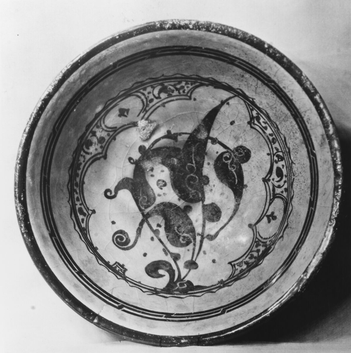 Bowl, Stonepaste;  painted and incised under transparent turquoise glaze