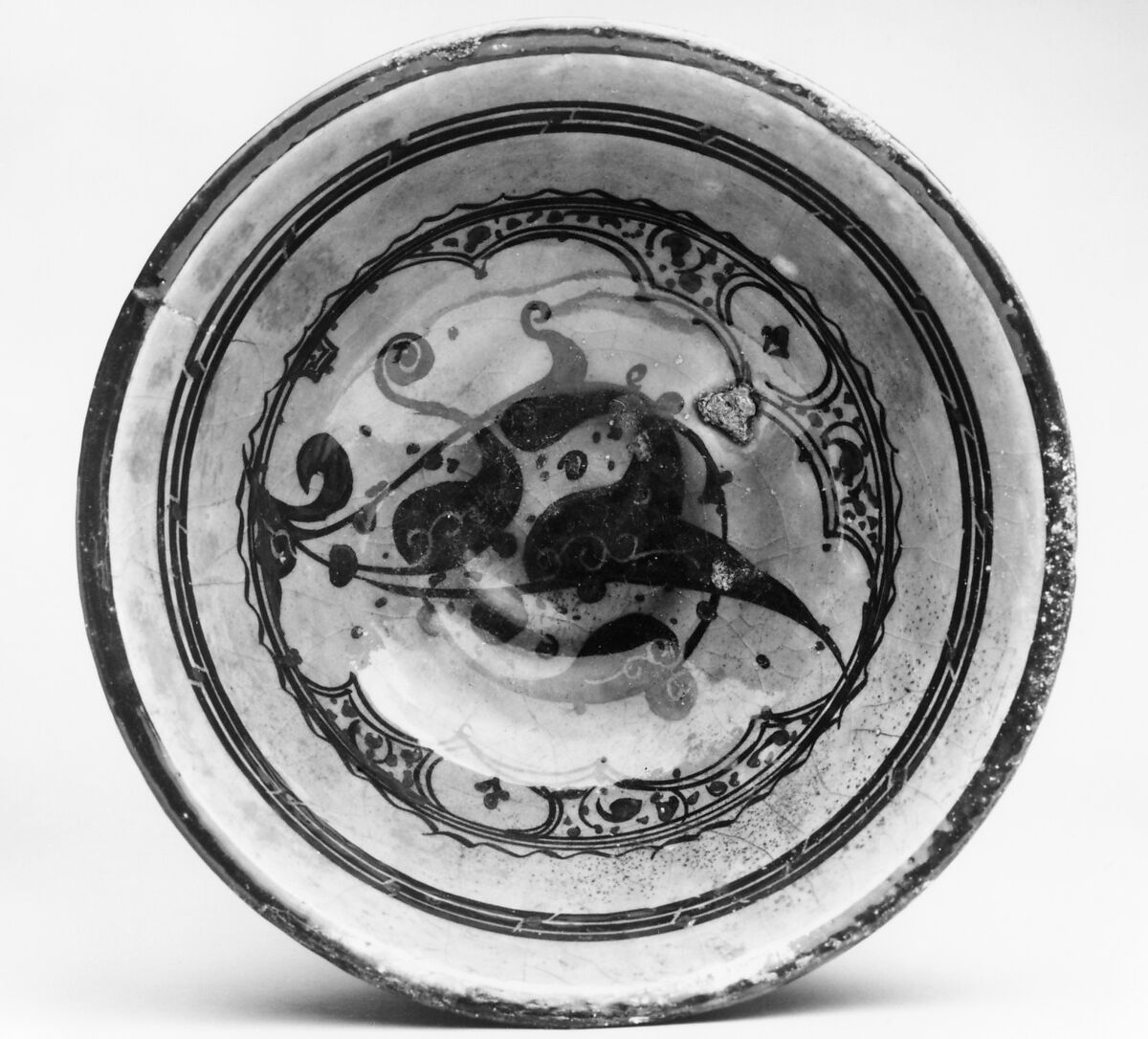 Bowl, Stonepaste;  painted and incised under transparent turquoise glaze