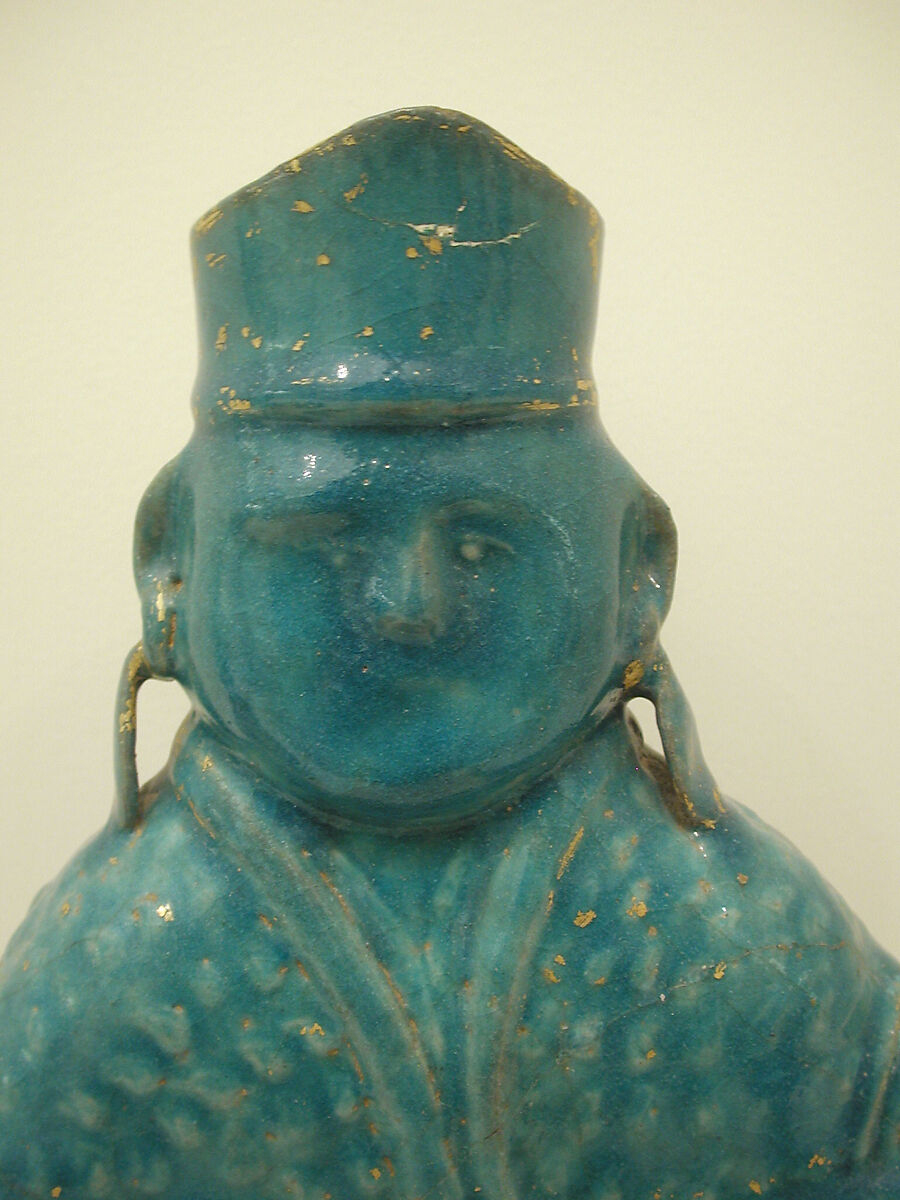 Bottle in the Form of a Lute Player, Stonepaste; molded, turquoise-glazed, partially gilded