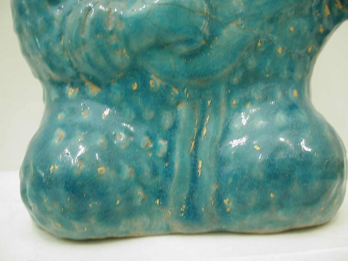 Bottle in the Form of a Lute Player, Stonepaste; molded, turquoise-glazed, partially gilded