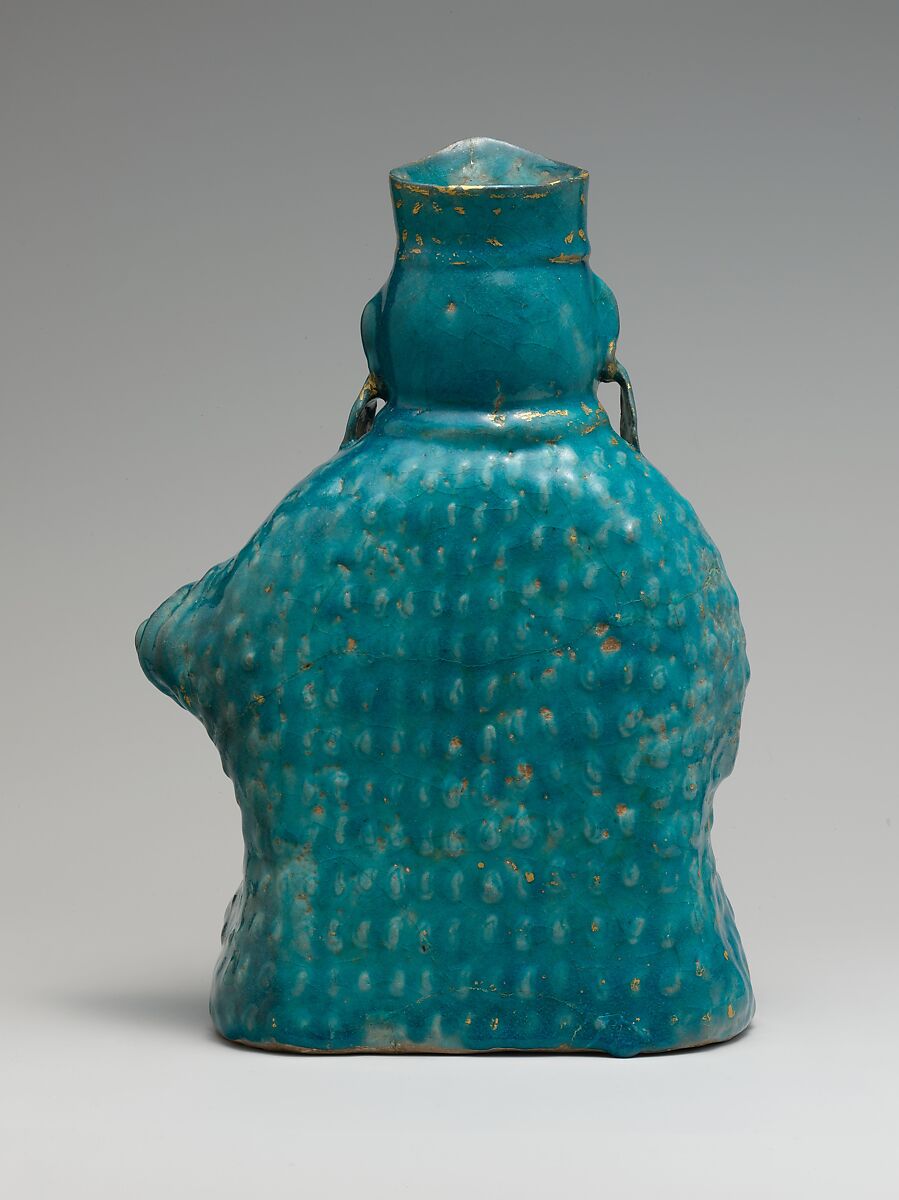 Bottle in the Form of a Lute Player, Stonepaste; molded, turquoise-glazed, partially gilded