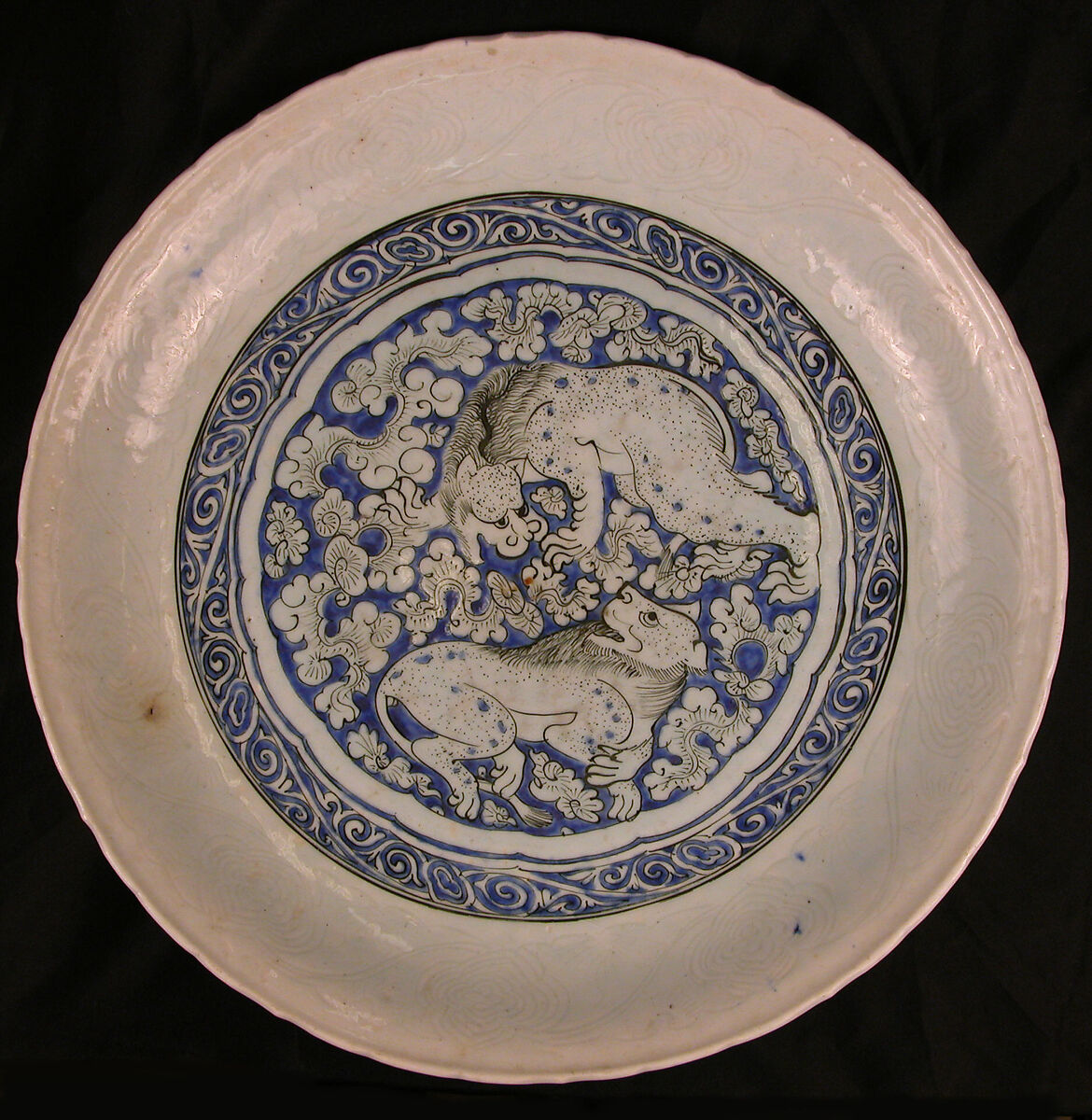Dish with Two Fighting Lions, Stonepaste; incised and painted under transparent glaze