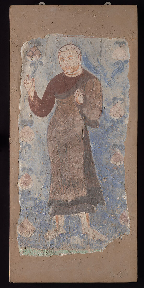 Monk Holding a Lotus, Pigments on mud plaster, China (Xinjiang Uyghur Autonomous Region) 