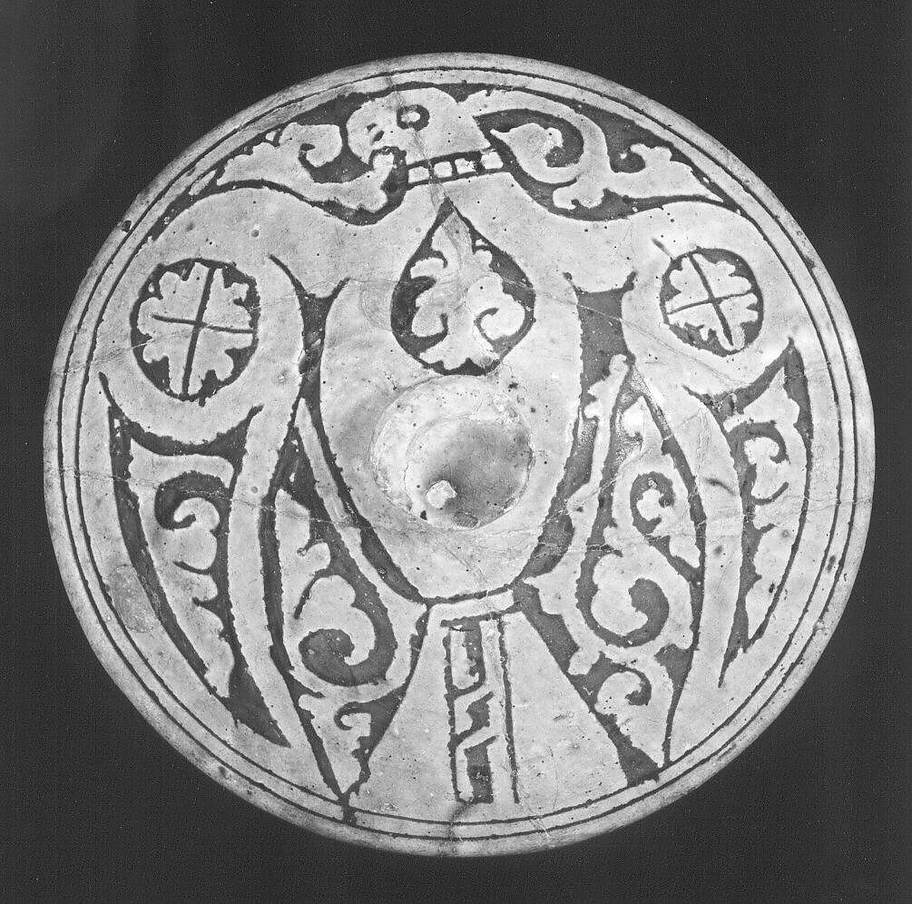 Lid, Earthenware; white slip-covered, carved decoration under a monochrome glaze (Garrus ware)