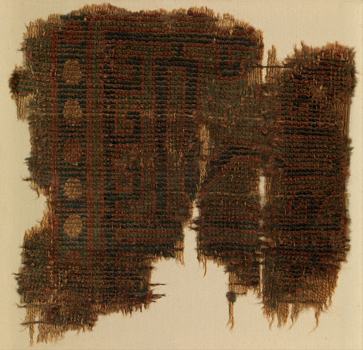 Fragment of a Carpet with Geometric Design, Wool (warp, weft and pile); symmetrically knotted pile