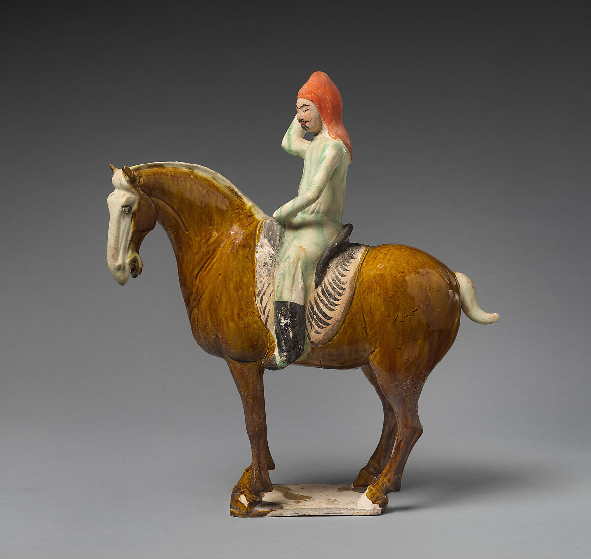 Horse and rider, Earthenware with three-color (sancai) glaze and pigment, China