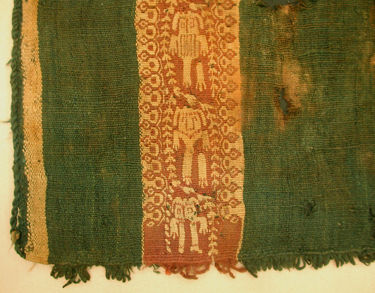 Child's Tunic with Hood, Tapestry weave in purple-colored, red-brown, and undyed wool on plain-weave ground of green wool; fringes in green and red-brown along the perimeter of the hood and lower edges