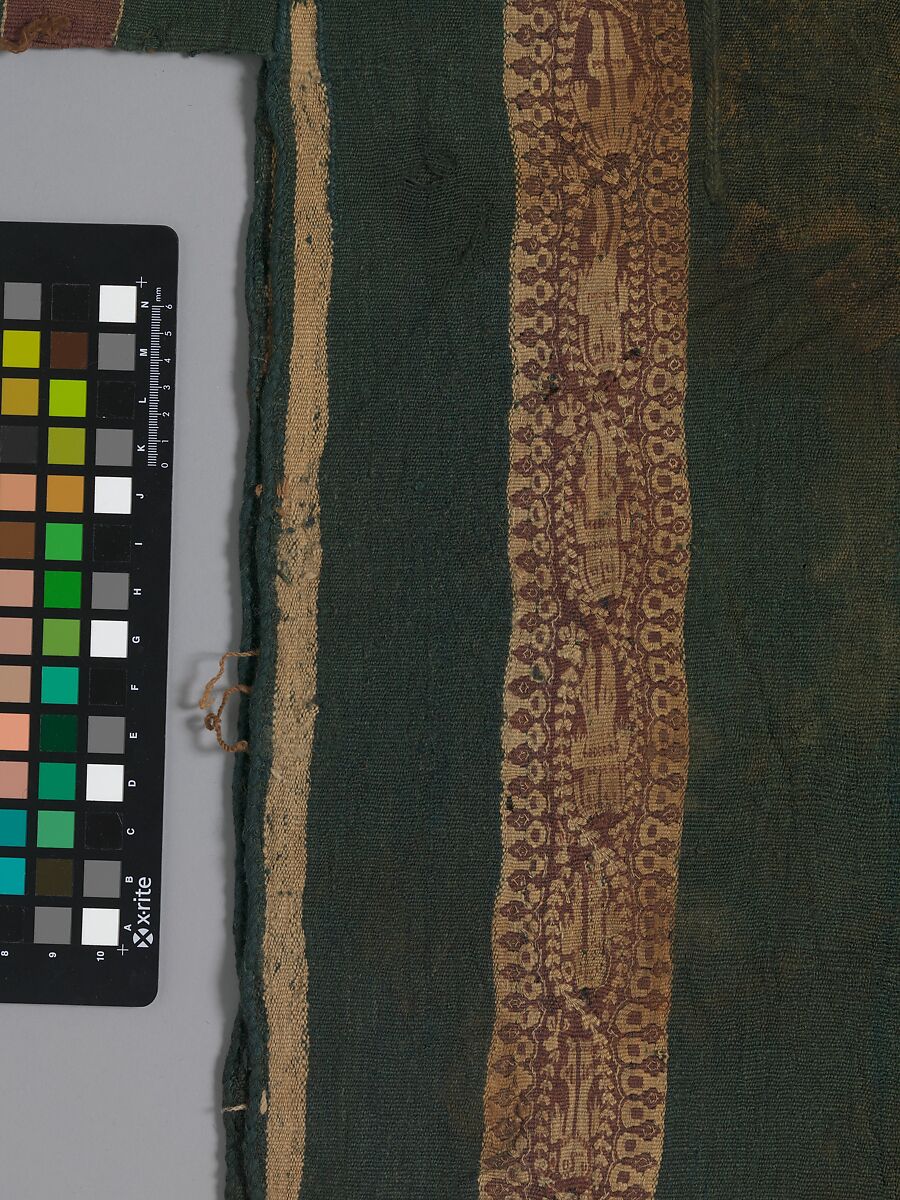 Child's Tunic with Hood, Tapestry weave in purple-colored, red-brown, and undyed wool on plain-weave ground of green wool; fringes in green and red-brown along the perimeter of the hood and lower edges