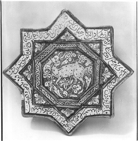 Star-Shaped Tile, Stonepaste: inglaze painted in blue and turquoise and luster-painted on an opaque white glaze