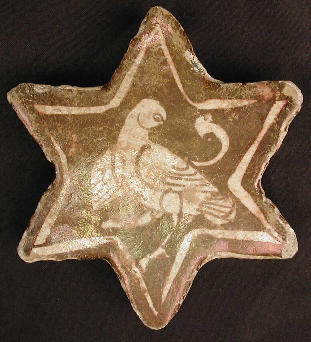 Star-Shaped Tile, Stonepaste; overglaze and luster-painted 