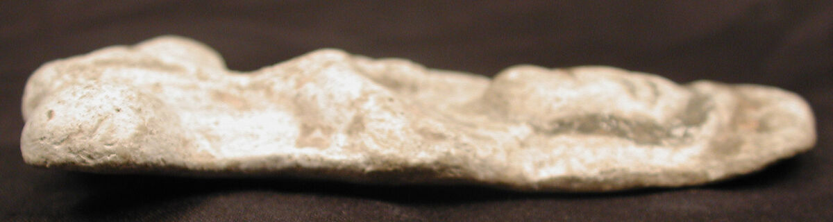 Seated Tambourine Player, Stucco; molded and painted