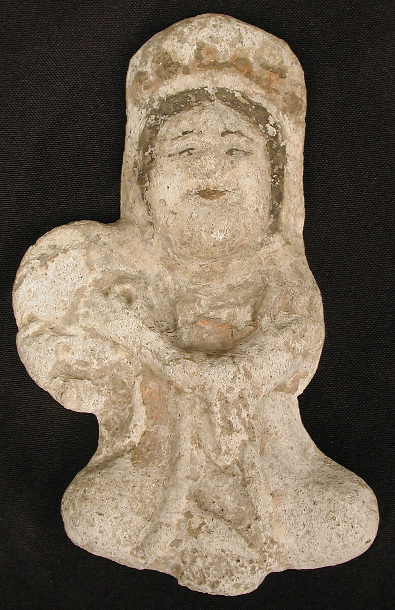 Seated tambourine player, Stucco; molded and painted 